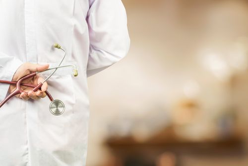 Doctor holding stethoscope